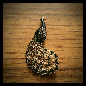 Vintage black peacock brooch